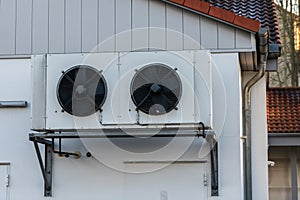 Air conditioning on a house wall