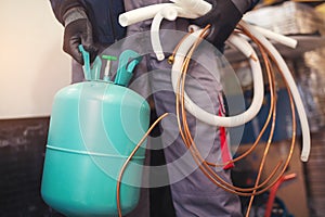 Air conditioning master preparing to install new air conditioner