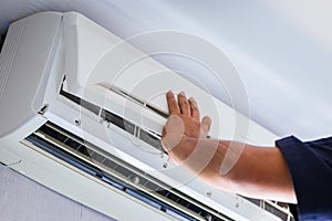 Air Conditioning Repair, Repairman fixing air conditioning system, Male technician service for repair and maintenance of air