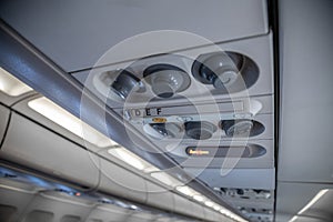 Air conditioning system of an airplane overhead regulator to  control the temperature and the flowing of the oxygen while smoking