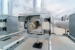 The air conditioning system of a industrial building is located on the roof photo