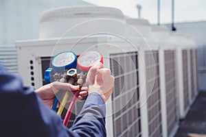 Air conditioning technician and a part of preparing to install new air conditioner.