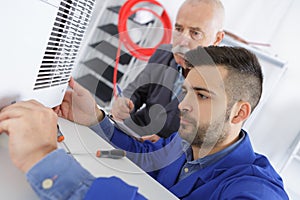 air conditioning technician at work