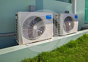 Air conditioning units outside an apartment complex