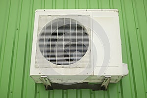 Air conditioning on wall. White air conditioning on building. Cooling system