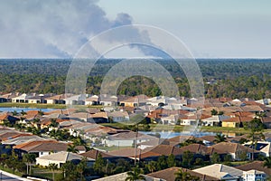 Air contamination with burning smoke from prescribed fire close to suburban area in Florida, USA