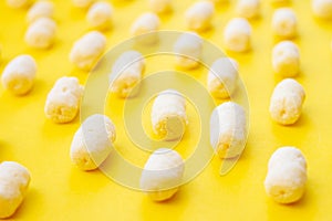 Air corn sticks pattern texture on yellow background