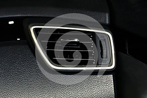 Air deflector for car interior with regulators photo