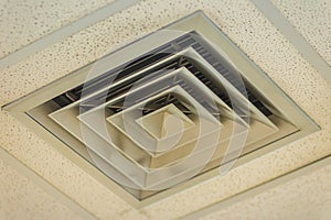 Air duct in square shape on the office ceiling. Air condition vent modern air conditioner or air vent on ceiling white, Duct for