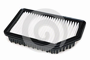 Air filter rectangular shape without one corner, aftermarket part isolated on a white background