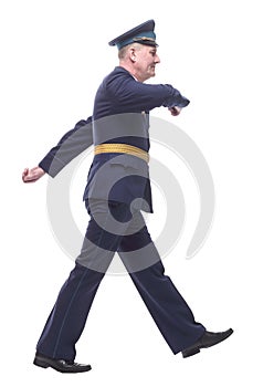 air force officer striding forward. isolated on a white