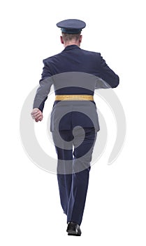 air force officer striding forward. isolated on a white