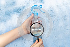 Air freshener floating in soapy water. Harmful composition of ingredients. Remedy with Phthalates. The concept of hazardous