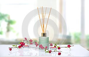 Air freshener,liquid fragrance in aroma sticks on table.Home scent,aroma therapy