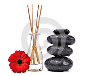 Air freshener with wooden aroma sticks and black spa stones