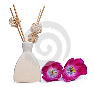 Air freshener with wooden aroma sticks and tulip flowers