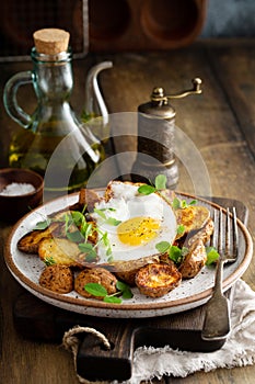 Air fried new potatoes topped with egg