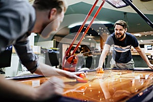 Air hockey is fun even for adults