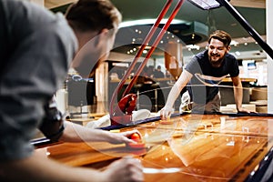 Air hockey is fun even for adults