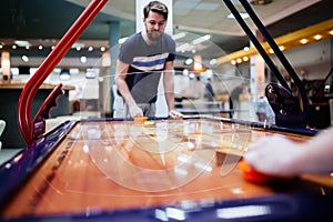 Air hockey is fun even for adults