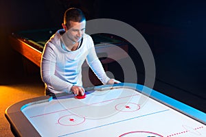 Air hockey game is fun even for adults