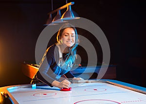 Air hockey game is fun even for adults