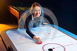 Air hockey game is fun even for adults