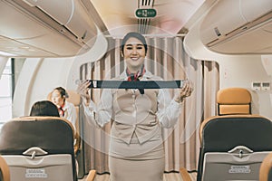Air hostess Demonstration In-Flight Safety instrument instructions to Cabin crew on Preflight