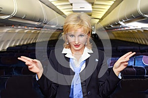 Air hostess gesturing