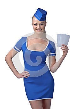 Air hostess holding two tickets to the flight