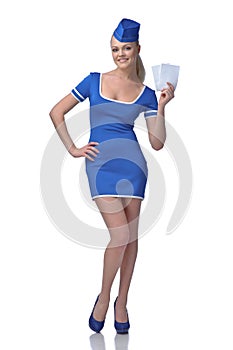 Air hostess holding two tickets to the flight