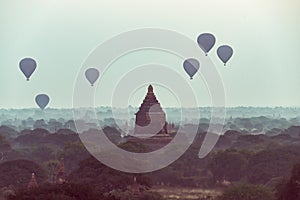 Air hot balloons on pagoda field at Bagan , Myanmar