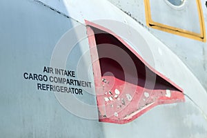 Air intake cargo compartment refrigerator decal on an old aircraft