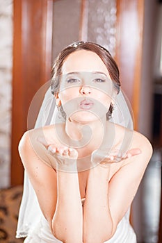 Air kiss the bride