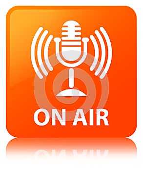 On air (mic icon) orange square button