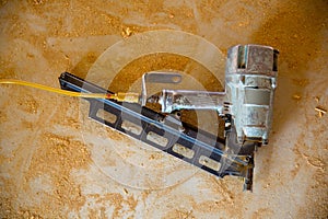 Air nail gun pneumatic framing nailer sawdust floor