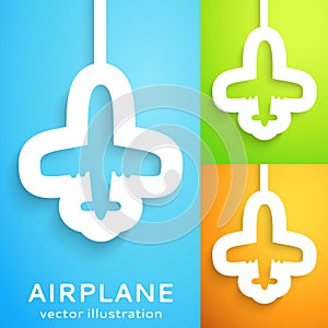 Air plane cut out of paper on color background.