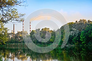 Air pollution from chimneys at industrial factory plant