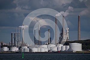 Air pollution from chimneys at industrial factory plant