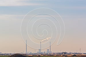 Air pollution from coal-powered plant smoke stacks