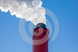 Air pollution from a natural gas and coal power plant. Emissions of harmful substances into the atmosphere. Traditional