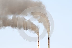 Air pollution by smoke coming out of factory