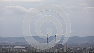 Air pollution by smoke from factory chimneys