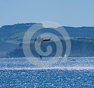 Air sea rescue helicopter, over the coast of Santander.