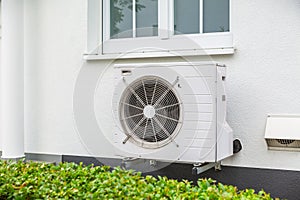 Air source heat pumps installed outside of city house