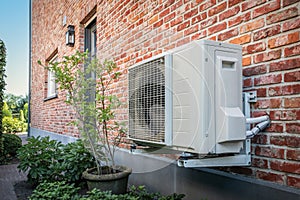 Air to air heat pump for cooling or heating the home. Outdoor unit powered by renewable energy.