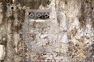 Air vent on a dilapidated wall