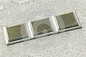 Air vent  on the exterior wall of a house