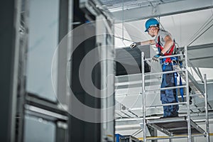 Air Ventilation Technician Checking Installed Shaft