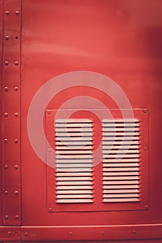 Air vents of a vintage red bus